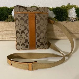 Coach crossbody bag with leather accents.